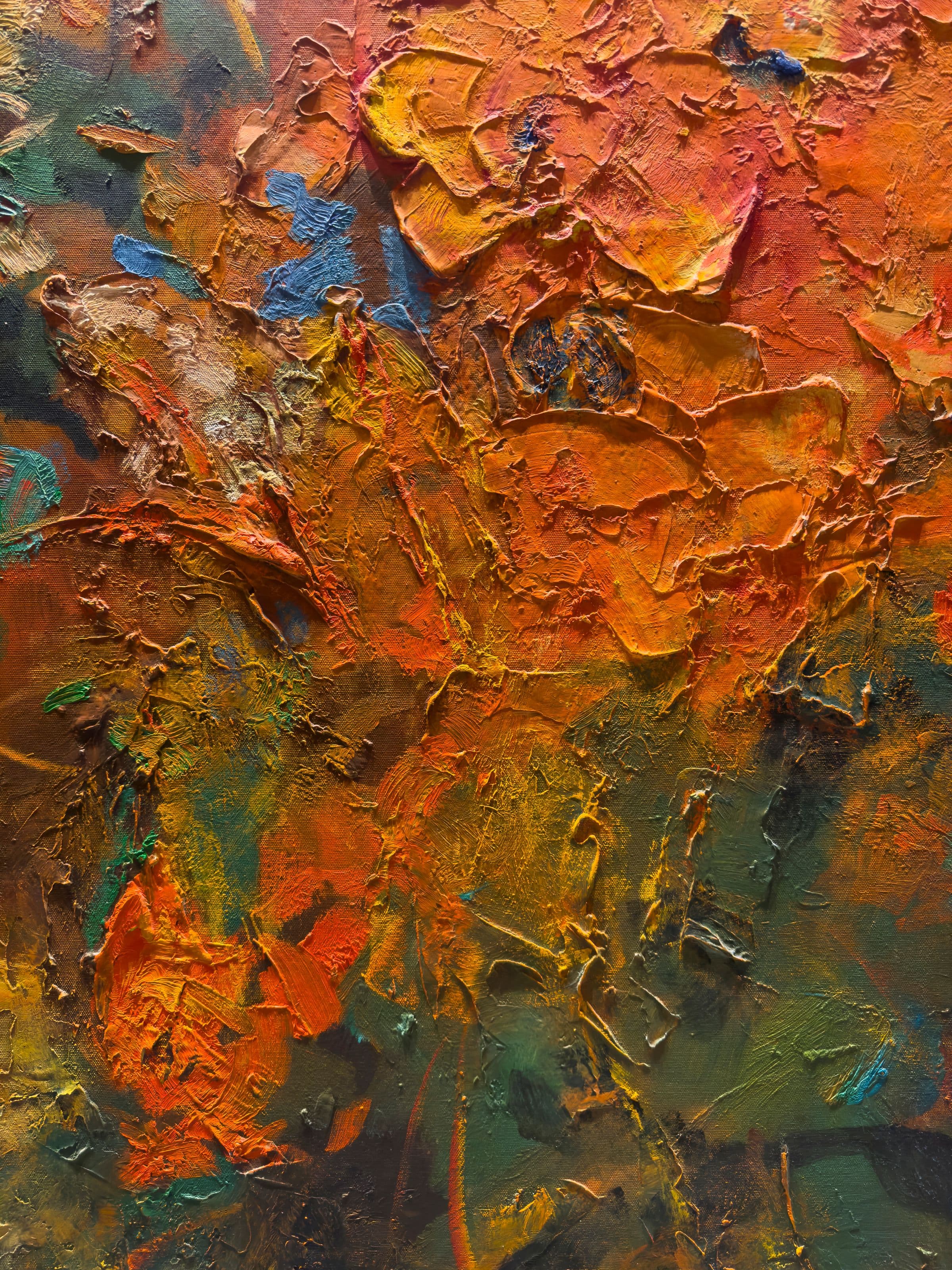 Close-up of thickly layered, hand-painted oil brushwork.